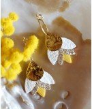 Boucles d'oreilles créoles Canari de la marque May & June. Dorées à l'or fin 24 carats et chutes de cuir françaises