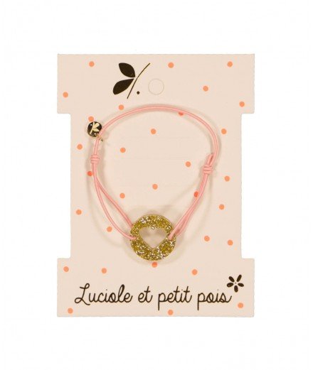 Bracelet pour enfant à élastique avec un joli coeur à paillettes en motif. De la marque Luciole et Petit Pois.