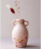 Vase en céramique avec le message "Lovely Nana" et un imprimé floral délicat.