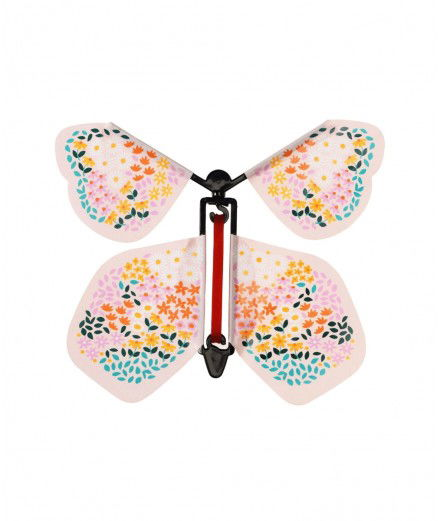 Papillon magique rose de la marque Rex London. Enroulez son élastique et il s'envolera !